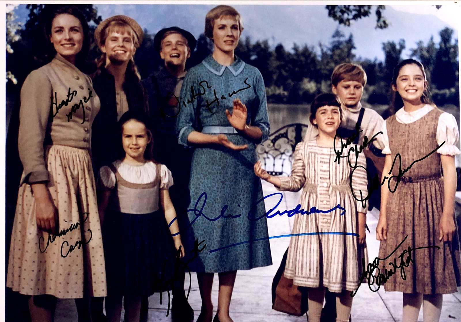 Julie Andrews Autograph Signed Sound of Music Photo: Category: Autograph Photo CollectiblesSize: Width 8 inches x Height 10 inchesAutograph Includes: Charmian Carr, Angela Cartwright, Duane Chase, Nicholas Hammond, Kym Karath, Heather Menzies-Urich, Deb