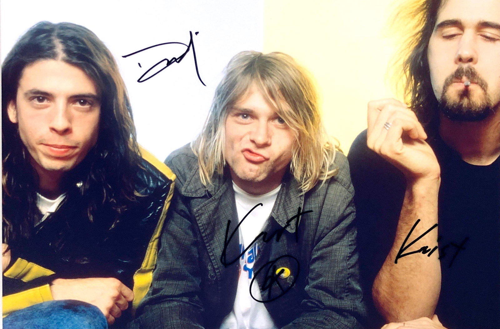 Kurt Cobain Autograph Signed Nirvana Photo: Category: Autograph Photo CollectiblesSize: Width 8 inches x Height 10 inchesAutograph Includes: Kurt Cobain, Dave Grohl, Krist NovoselicItem is in great condition with no damage, unframedIf image of 
