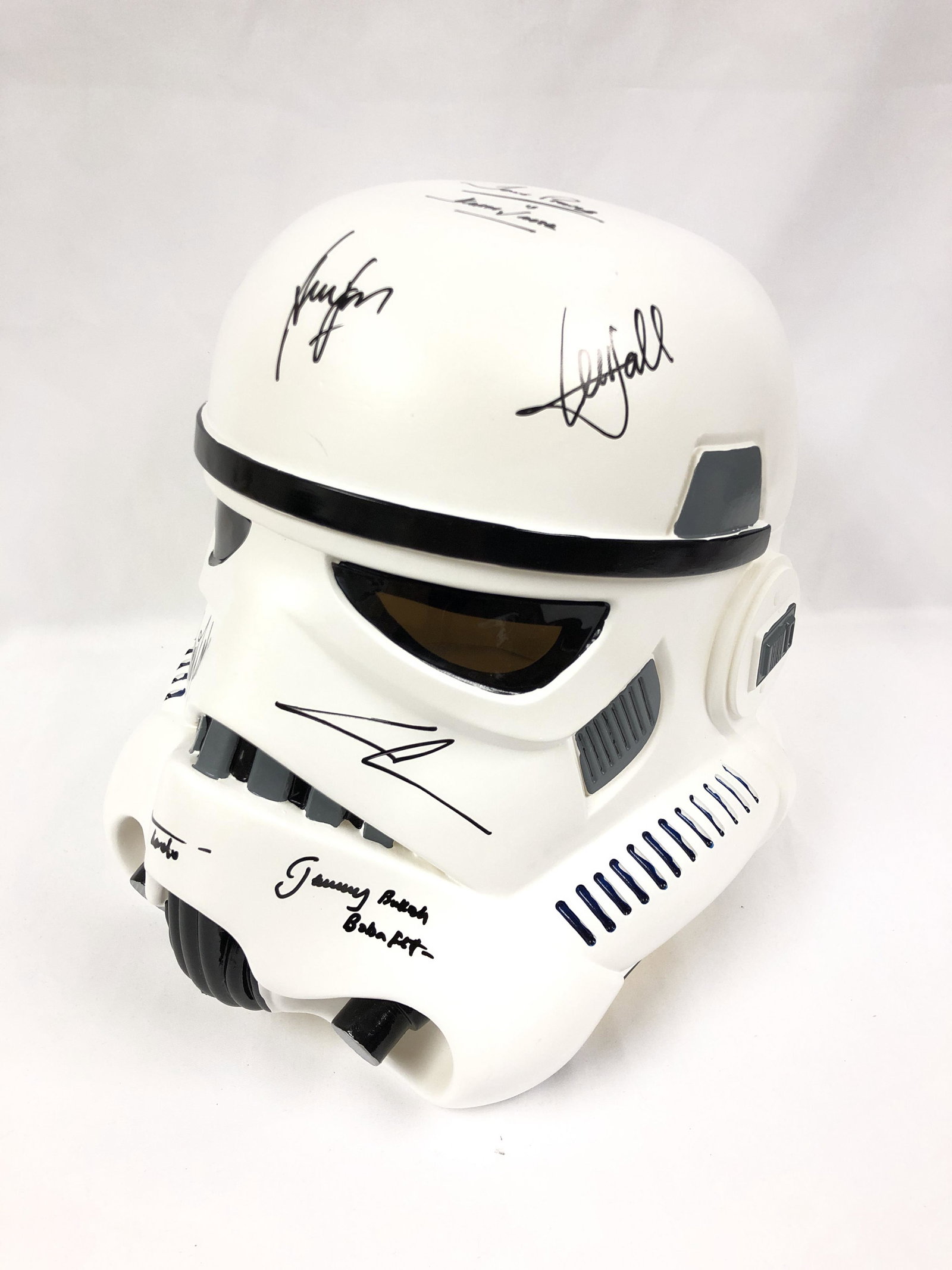 Star Wars White Soldier Signd Helmet: Autographed by:Dave Prowse, Peter Mayhew, Harrison Ford, Mark Hamill, Carrie Fisher, George Lucas, Billy Dee Williams, Jeremy BullochAuthentication Code: MP32790Item is in great condition with no dama