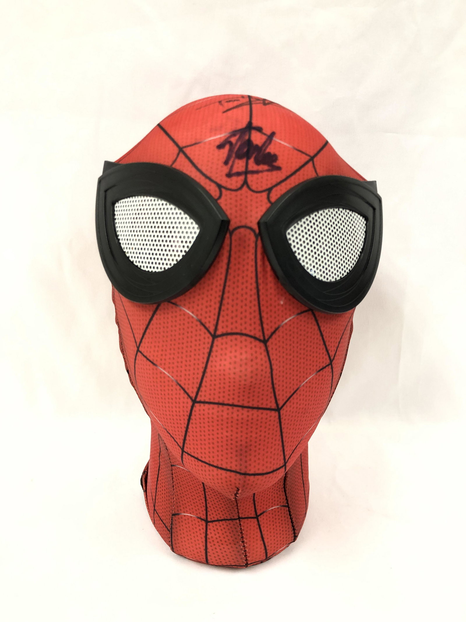 Spiderman Tom Holland Signd Mask: Autographed by:Tom Holland, Stan LeeAuthentication Code: MP32749Item is in great condition with no damage, unframed If image of documentation is not attached in the listing, the lot is sold without do