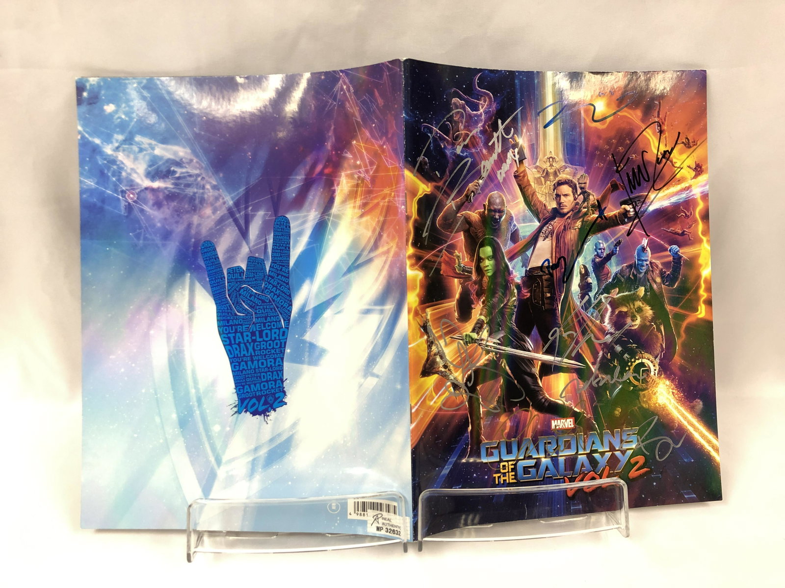 Guardians of the Galaxy 2 Signed Picture Book: Autographed by:Chris Pratt, Zoe Saldana, Bradley Cooper, Vin Diesel, Michael Rooker, Karen Gillan, Dave Bautista, Pom KlementieffAuthentication Code: MP32632Item is in great condition with no damage, 