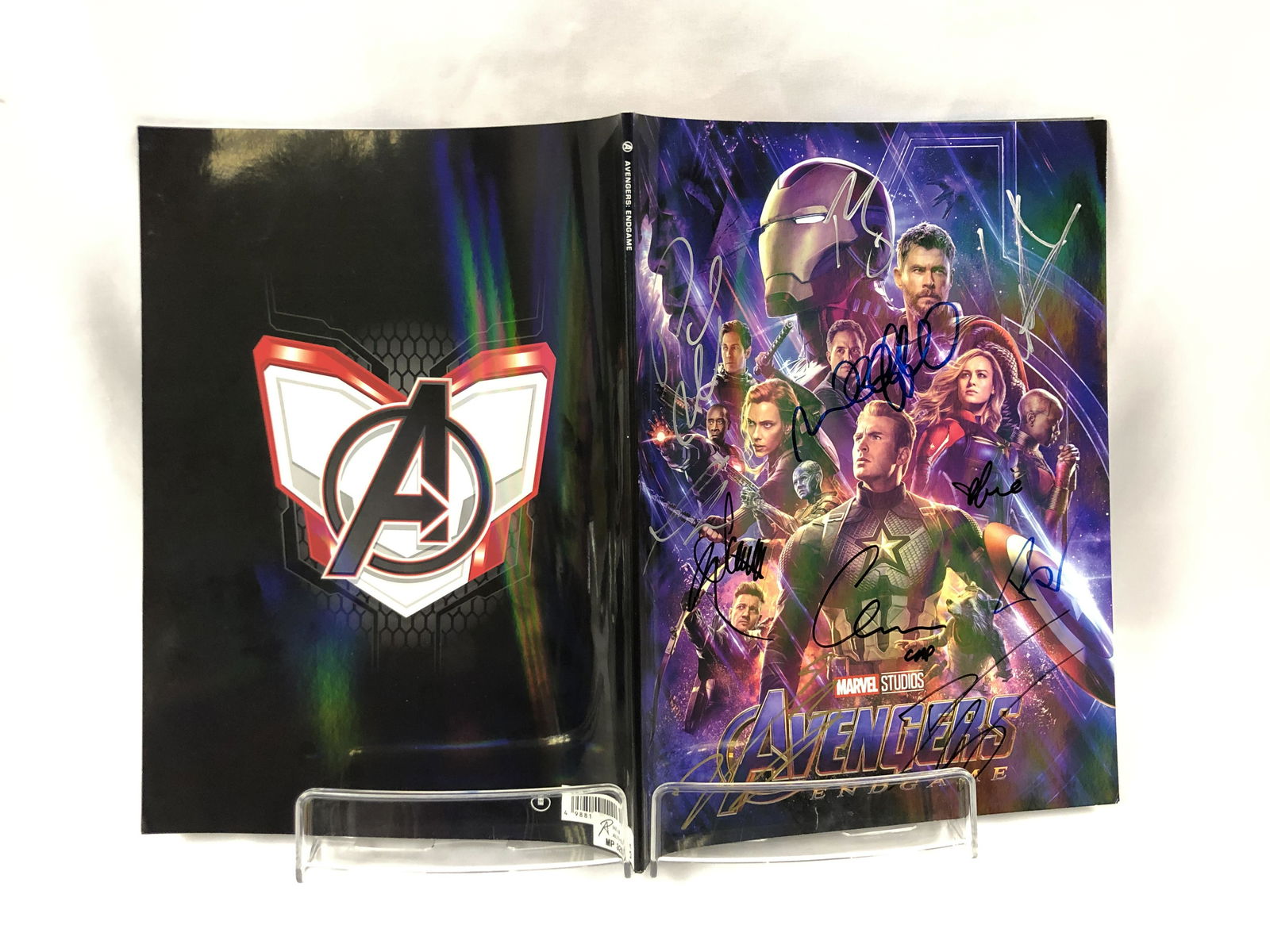 Avengers Endgame Signed Picture Book: Autographed by:Josh Brolin, Robert Downey Jr, Chris Evans, Chris Hemsworth, Brie Larson, Bradley Cooper, Scarlett Johannson, Mark Ruffalo, Danai Gurira, Paul RuddAuthentication Code: MP32630Item is in