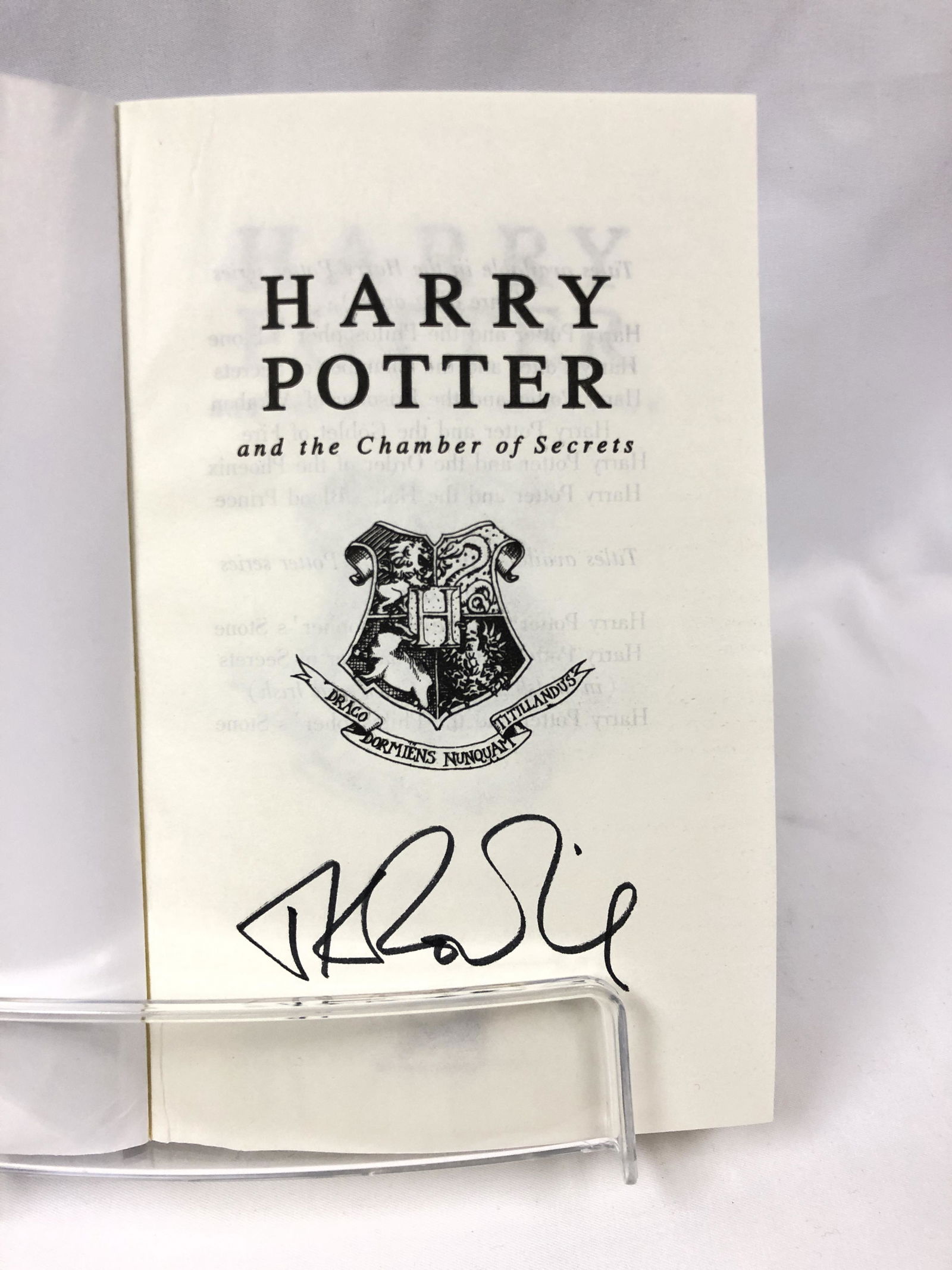 Harry Potter JK Rowling Signed Chamber of Secret Book: Autographed by:JK RowlingAuthentication Code: MP32834Item is in great condition with no damage, unframed If image of documentation is not attached in the listing, the lot is sold without documents. Pl