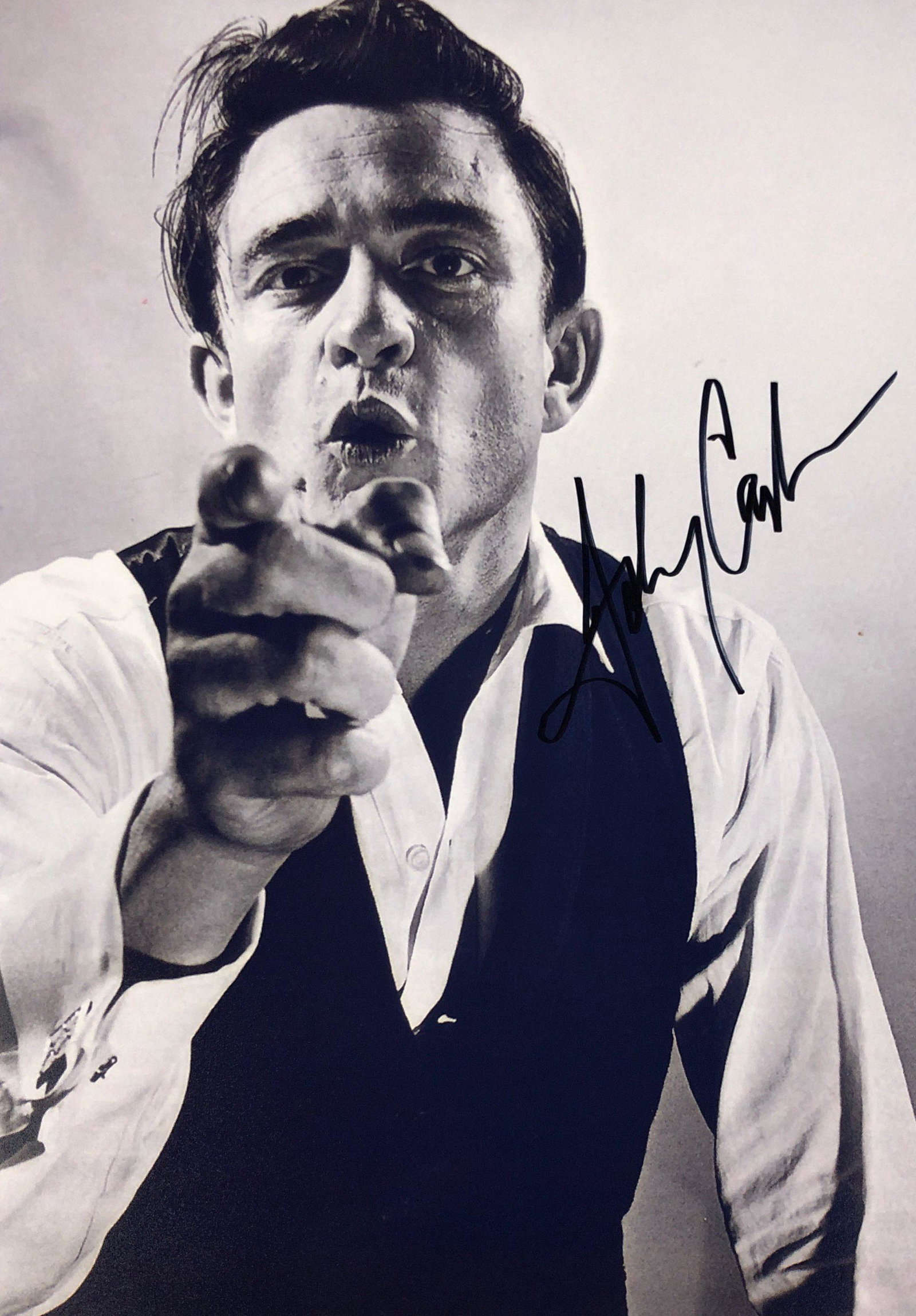 Johnny Cash Signed Photo: Autographed by:Johnny CashAuthentication Code: PC26344Item is in great condition with no damage, unframed If image of documentation is not attached in the listing, the lot is sold without documents. P