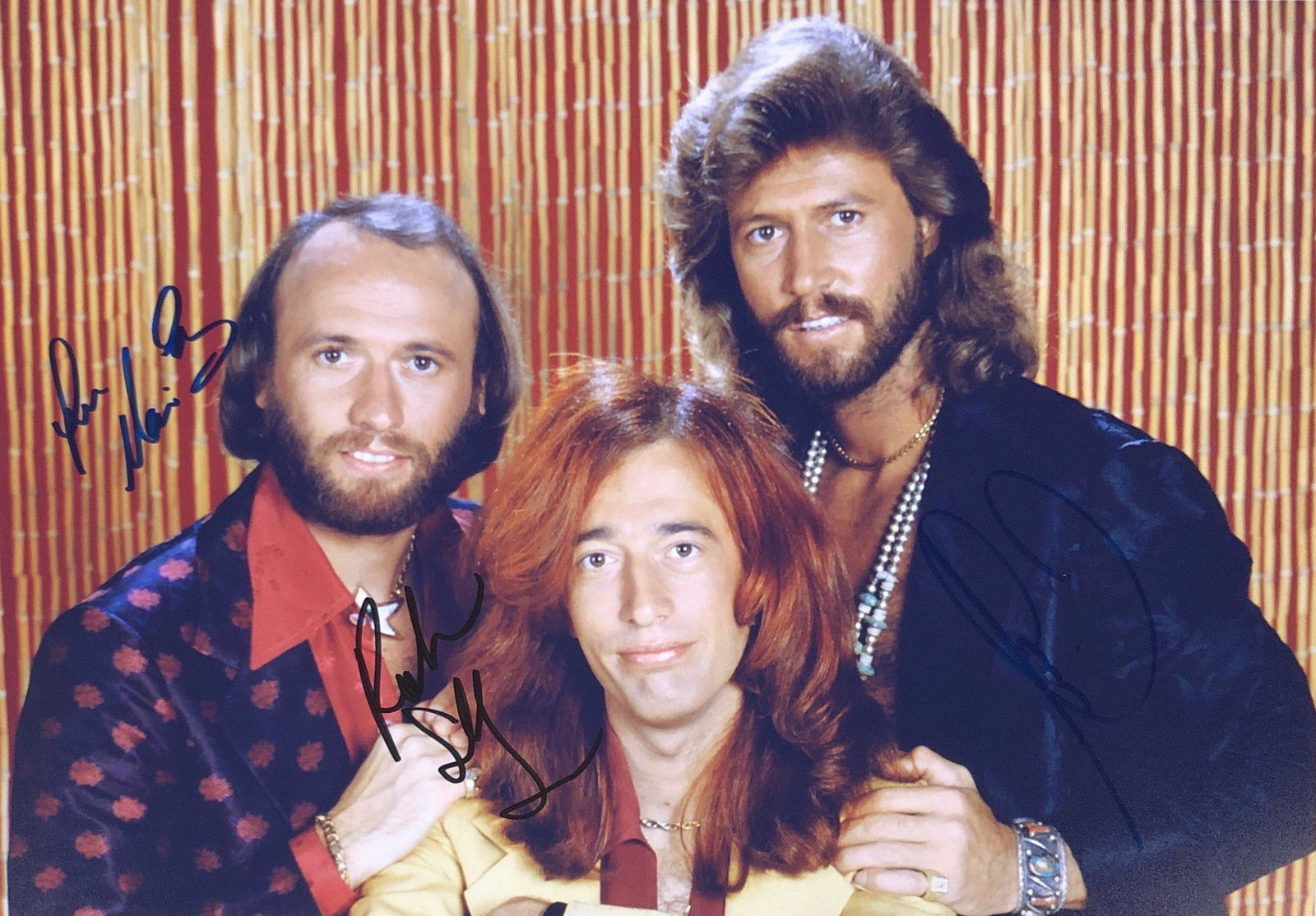Bee Gees Barry Gibb Signed Photo: Autographed by:Maurice Gibb, Robin Gibb, Barry GibbAuthentication Code: PC26356Item is in great condition with no damage, unframed If image of documentation is not attached in the listing, the lot is 