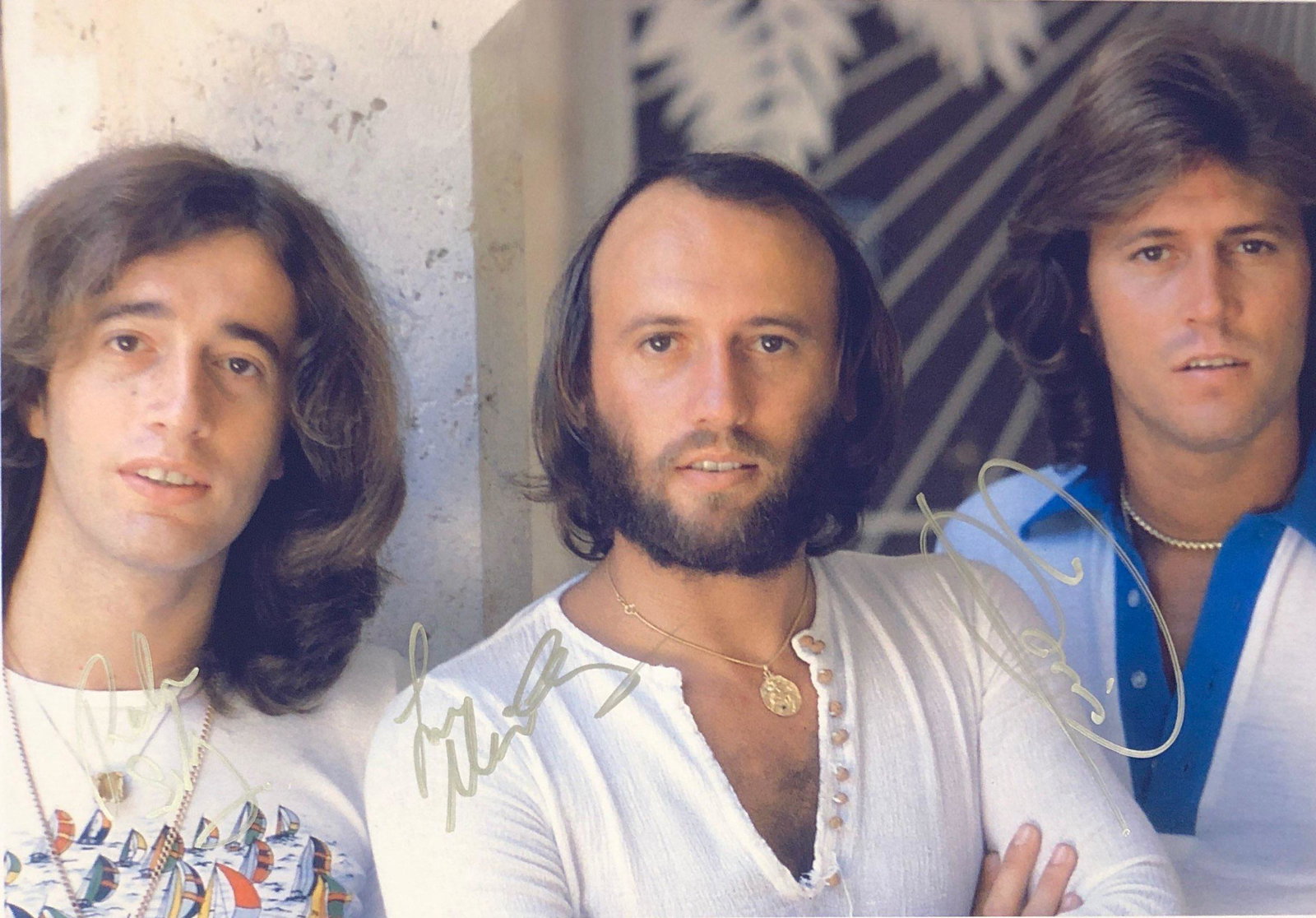 Bee Gees Barry Gibb Signed Photo: Autographed by:Maurice Gibb, Robin Gibb, Barry GibbAuthentication Code: PC26359Item is in great condition with no damage, unframed If image of documentation is not attached in the listing, the lot is 