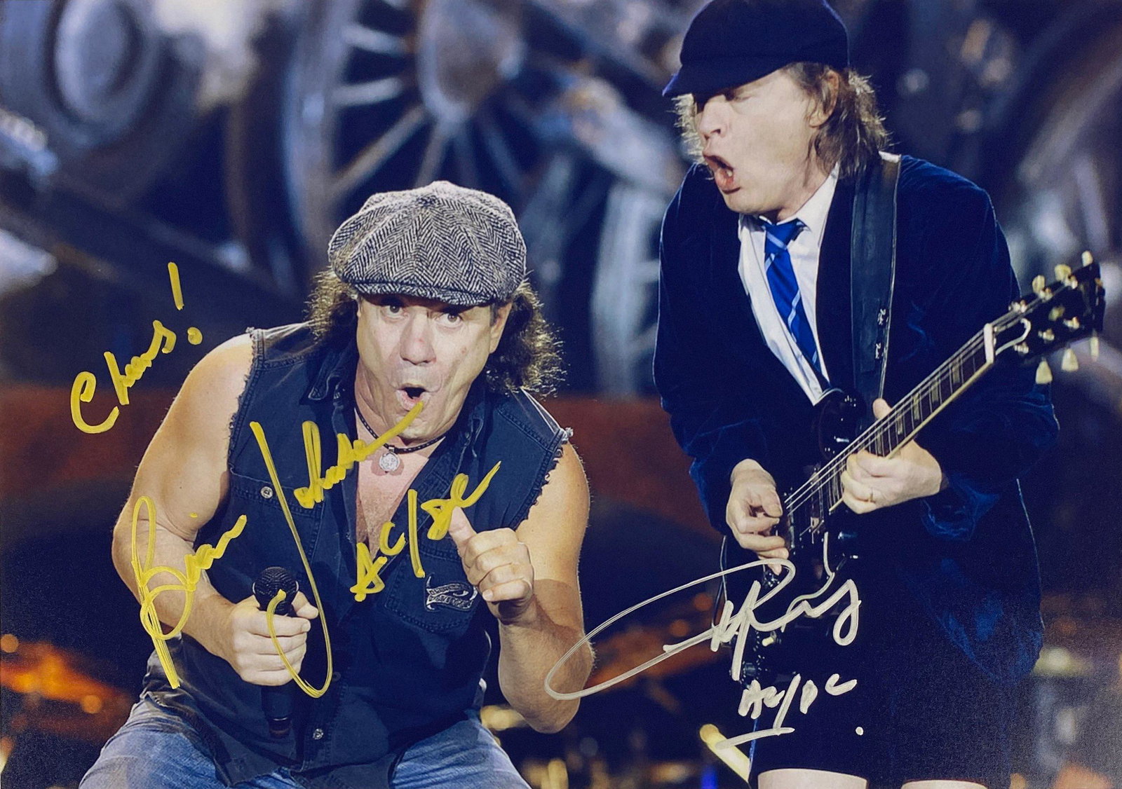 ACDC Angus Young Signed Photo: Autographed by:Angus Young, Brian JohnsonSize : 8" x 10"Authentication Code: PC26529Item is in great condition with no damage, unframed If image of documentation is not attached in the listing, the lo