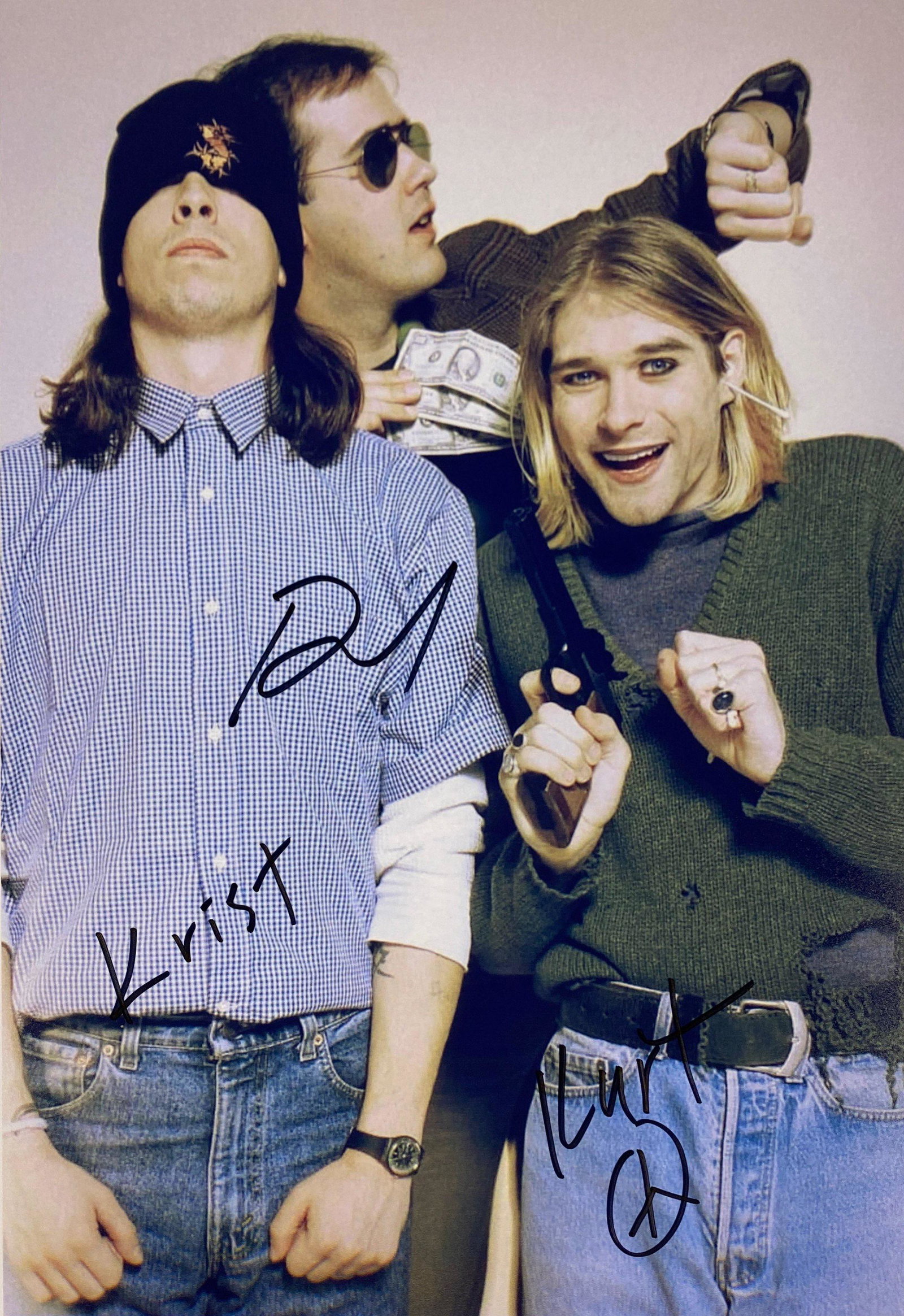 Nirvana Kurt Cobain Signed Photo: Autographed by:Kurt Cobain, David Grohl, Krist NovoselicSize : 8" x 10"Authentication Code: PC26536Item is in great condition with no damage, unframed If image of documentation is not attached in the 