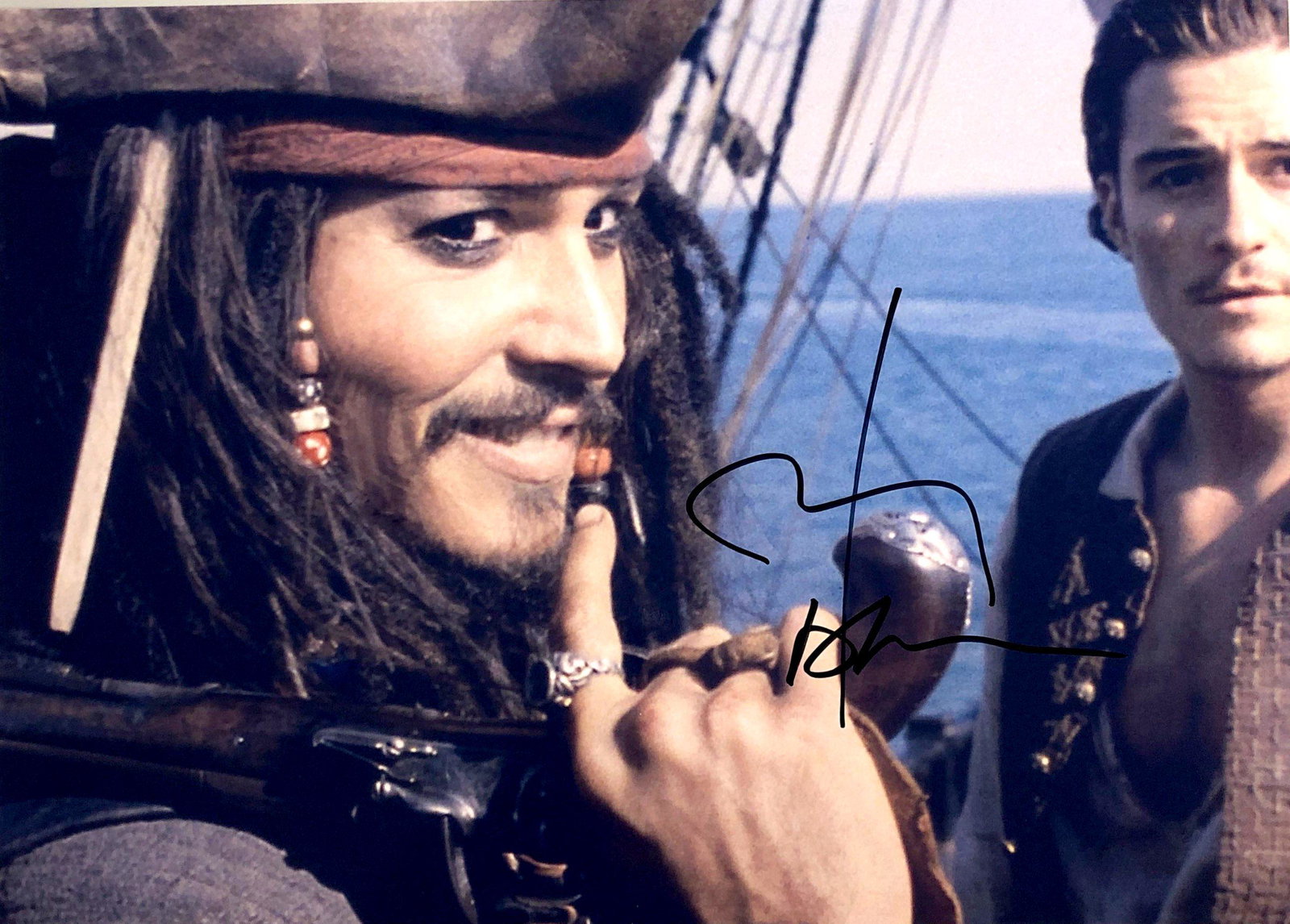 Johnny Depp Autograph Signed Pirates of the Caribbean: Category: Autograph Photo CollectiblesSize: Width 8 inches x Height 10 inchesAutograph Includes: Johnny DeppItem is in great condition with no damage, unframedIf image of documentation is not attached