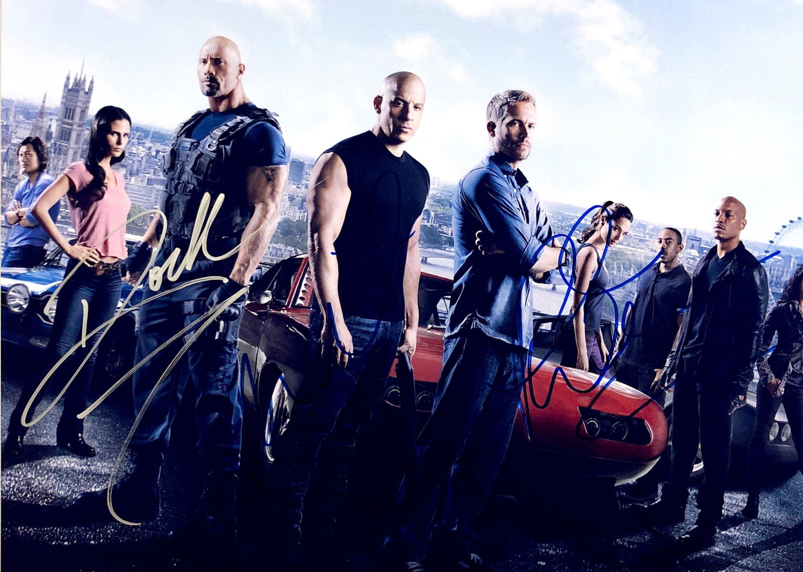 Paul Walker Vin Diesel Autograph Signed Fast and: Category: Autograph Photo CollectiblesSize: Width 8 inches x Height 10 inchesAutograph Includes: Vin Diesel, Paul Walker, RockItem is in great condition with no damage, unframedIf image of documentati