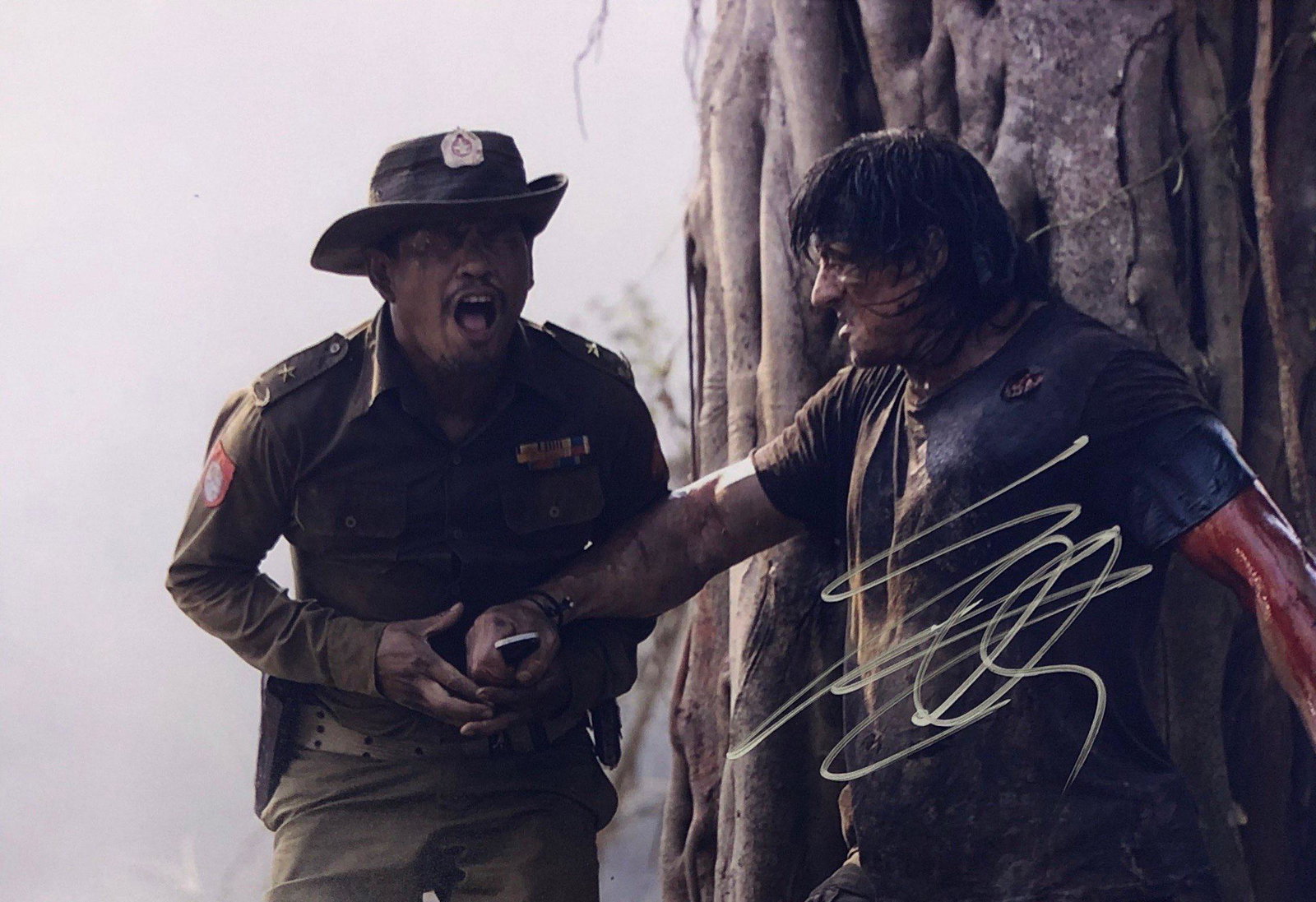 Sylvester Stallone Autograph Signed Rambo Photo: Category: Autograph Photo CollectiblesSize: Width 8 inches x Height 10 inchesAutograph Includes: Sylvester StalloneItem is in great condition with no damage, unframedIf image of documentation is not a