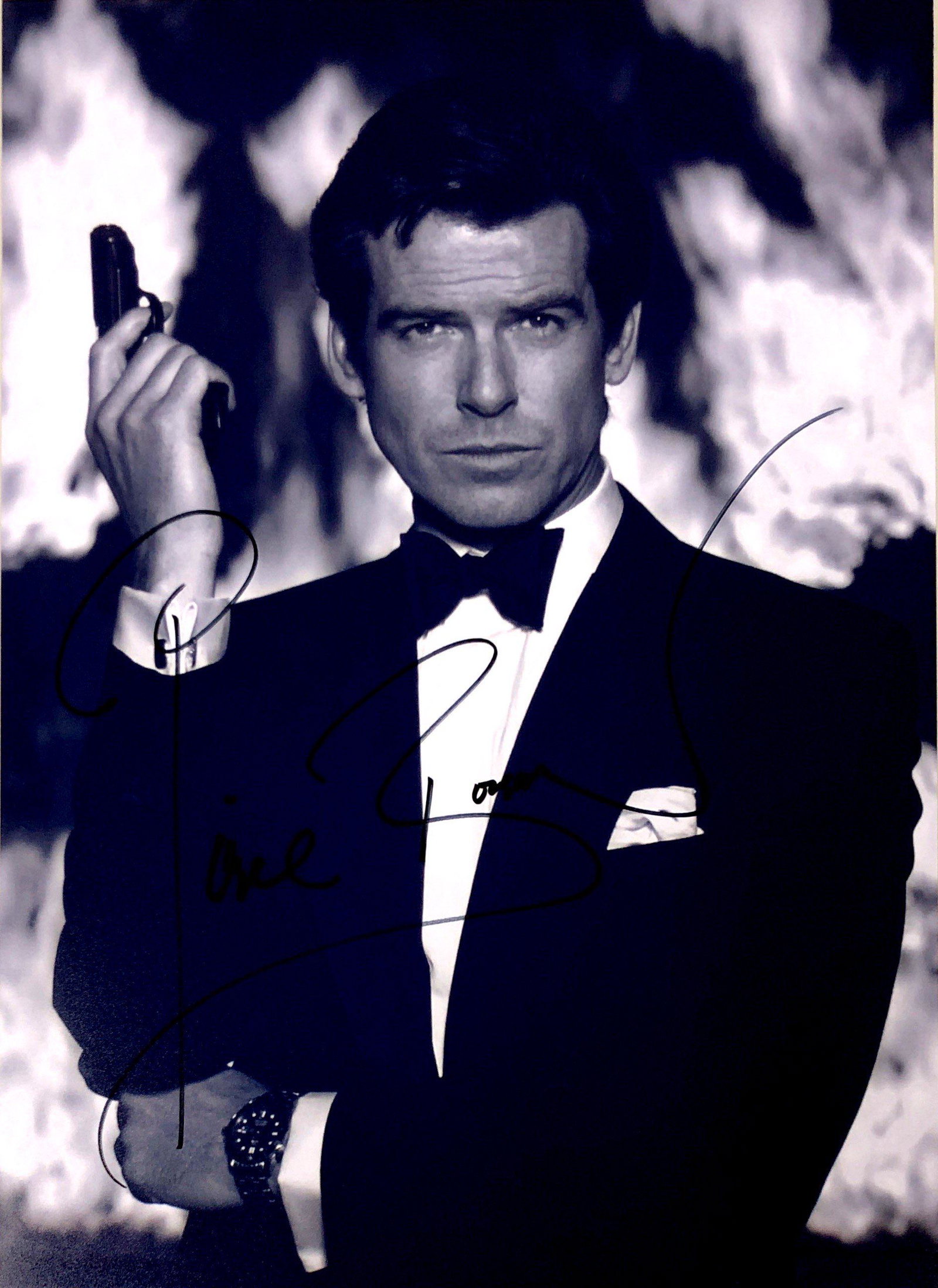 Pierce Brosnan Autograph Signed James Bond 007 Photo: Category: Autograph Photo CollectiblesSize: Width 8 inches x Height 10 inchesAutograph Includes: Pierce BrosnanItem is in great condition with no damage, unframedIf image of documentation is not attac
