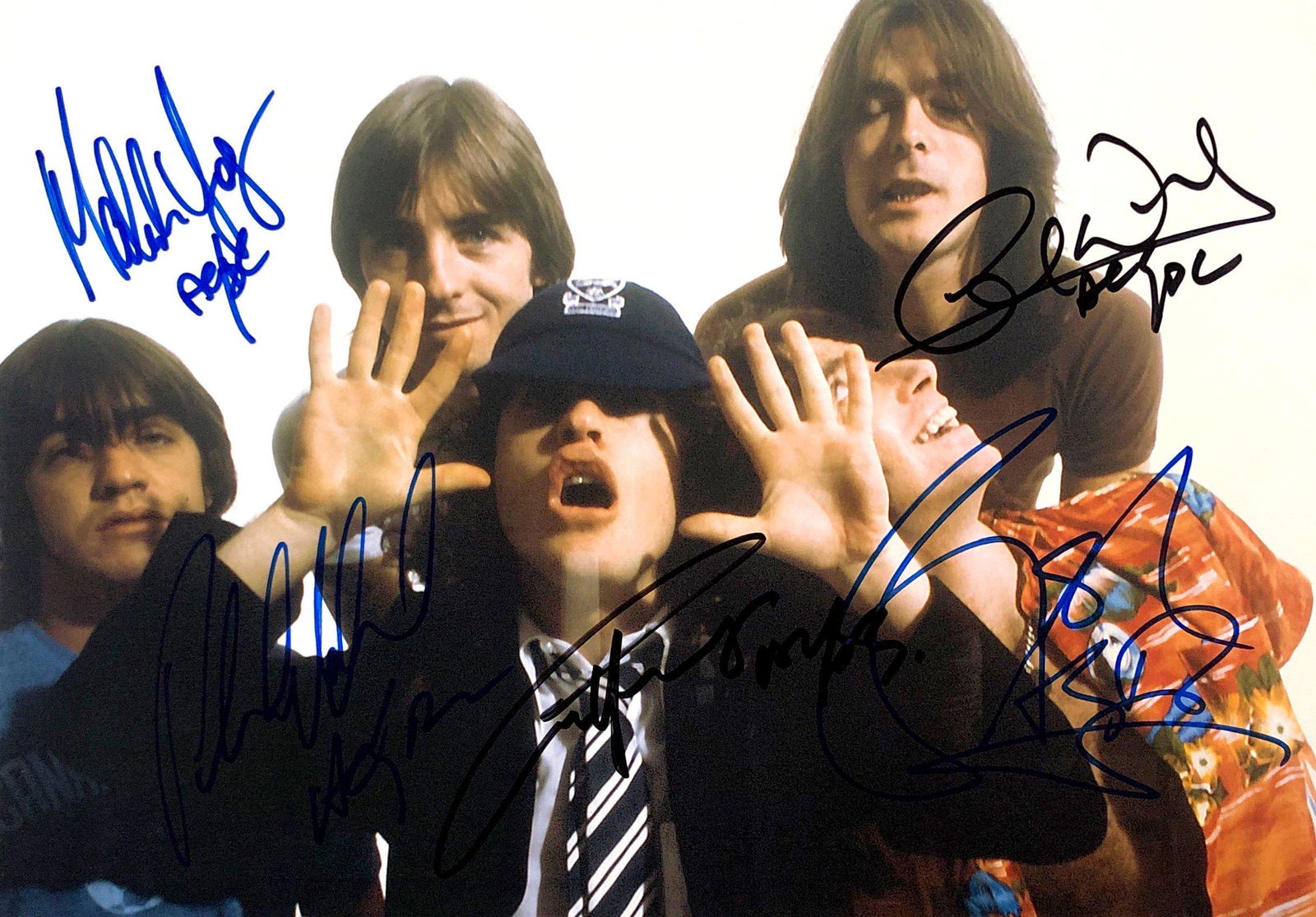 Malcolm Young Autograph Signed ACDC Photo: Category: Autograph Photo CollectiblesSize: Width 8 inches x Height 10 inchesAutograph Includes: Malcolm Young, Bon Scott, Angus Young, Cliff Williams, Phil RuddItem is in great condition with no dama