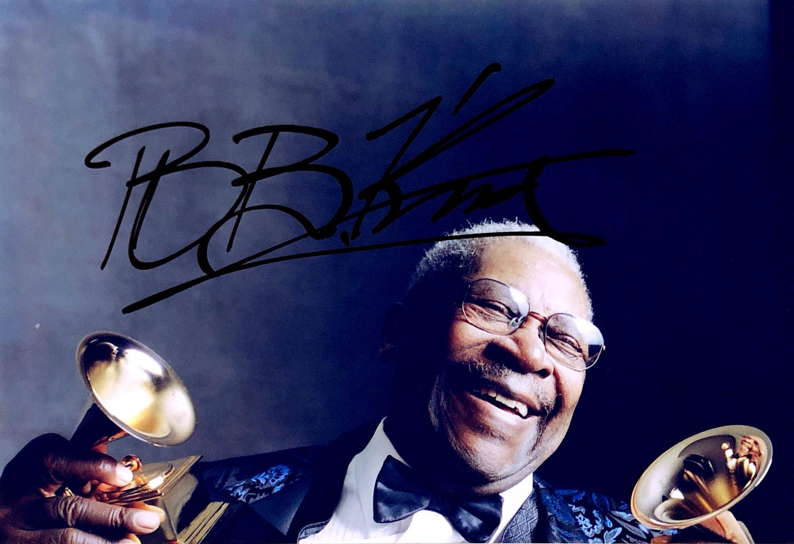 BB King Autograph Signed Photo: Category: Autograph Photo CollectiblesSize: Width 8 inches x Height 11 inchesAutograph Includes: BB KingItem is in great condition with no damage, unframedIf image of documentation is attached in the 
