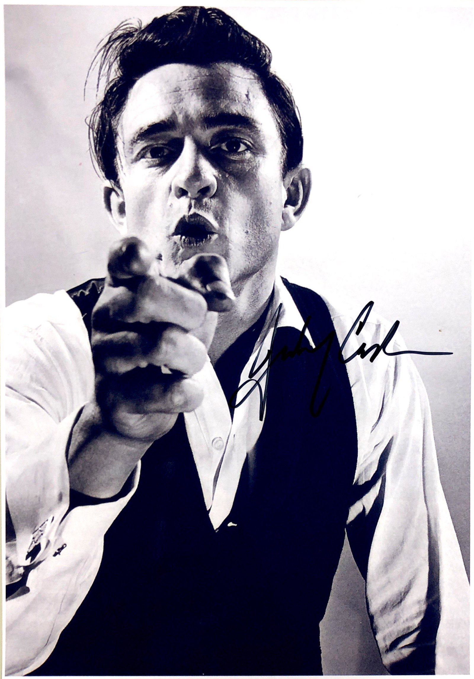 Johnny Cash Autograph Signed Photo: Category: Autograph Photo CollectiblesSize: Width 8 inches x Height 11 inchesAutograph Includes: Johnny CashItem is in great condition with no damage, unframedIf image of documentation is attached in 