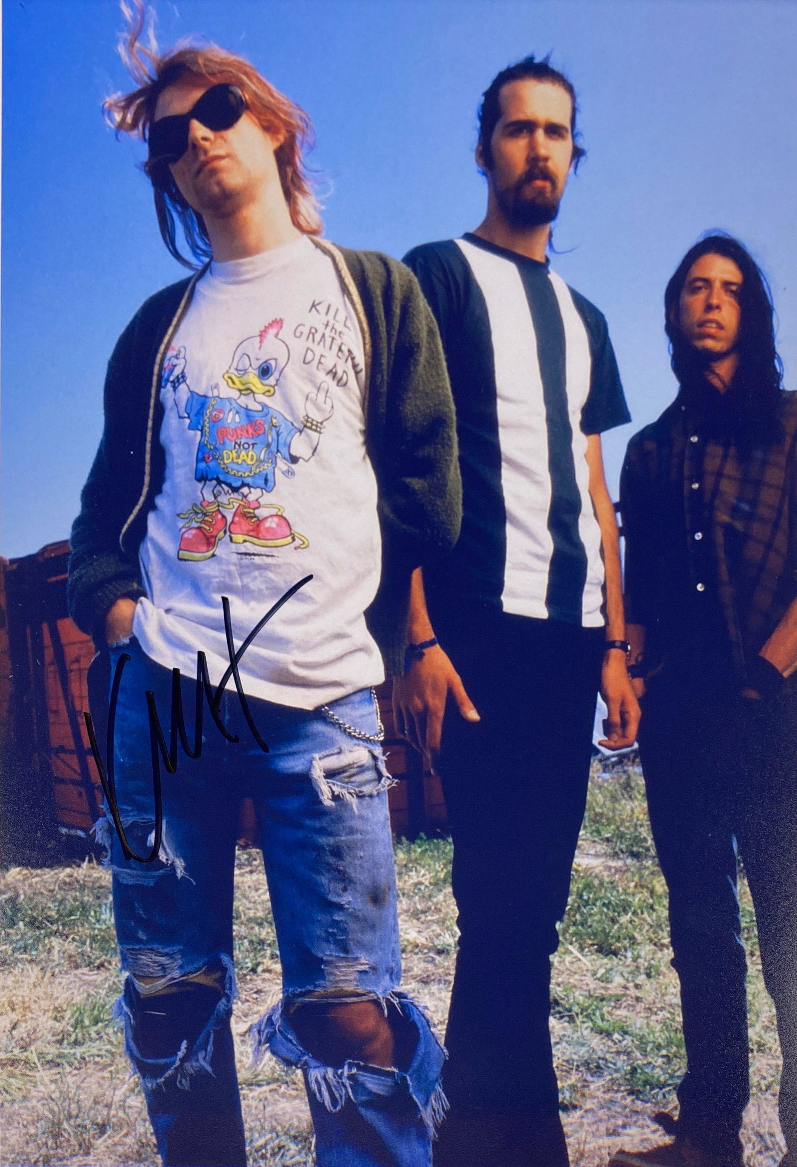 Kurt Cobain Autograph Signed Nirvana Photo: Category: Autograph CollectiblesAutograph Includes: Kurt CobainItem is in great condition with no damage, unframedIf image of documentation is attached in the listing, the lot is sold with documents. 