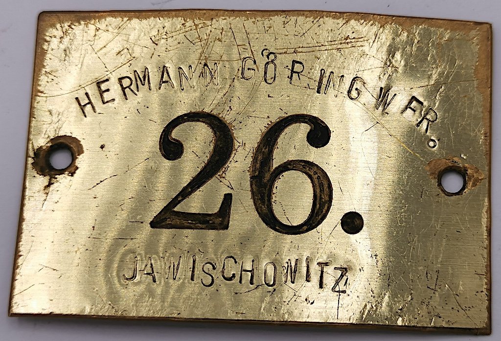 KZ AUSCHWITZ SUBCAMP HERMANN GOERING WERKE PLATE ID: CONCENTRATION CAMP AUSCHWITZ SUBCAMP JAWISCHOWITZ HERMANN GOERING WERKE MACHINE PLATE ID rare item. original. JAWISCHOWITZ is a sub-camp located in the village of Jawiszowice (in German: Jawischowitz)