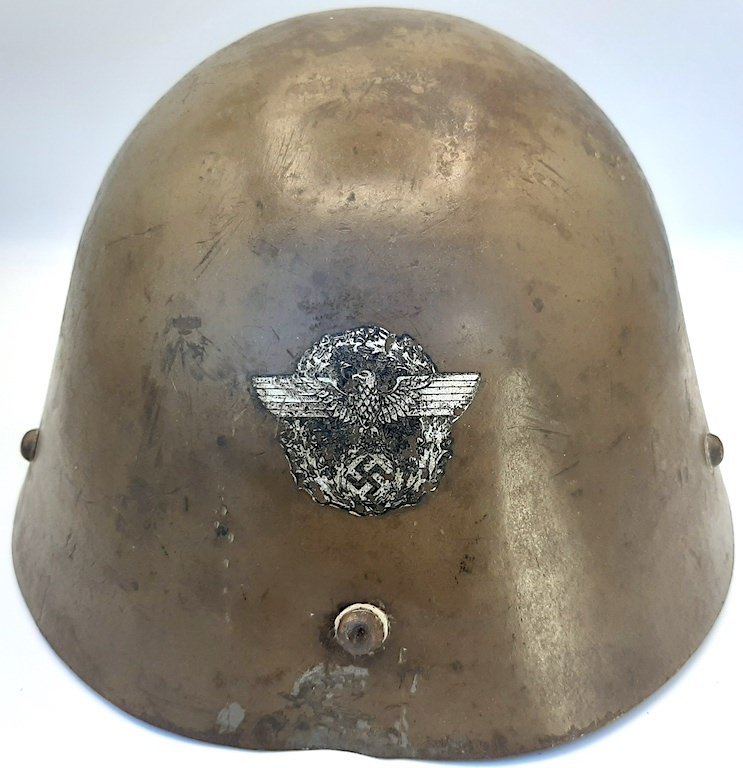 WW2 GERMAN NAZI ALBANIAN POLICE M33 CZECH HELMET RARE: M33 Czech shell having its 5 pads fully intact. One visible dent just on the edge, below the decal. Chin strap has a split built into it and is intact as well. Decal is the unique eagle of the Albania