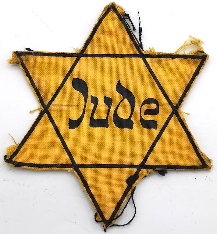 WORN STAR OF DAVID JUDE GETTO GHETTO JEWISH HOLOCAUST: AN AMAZING RARE EXAMPLE OF A WORN JEWISH STAR OF DAVID. THIS IS A JUDE VARIATION, WORN IN GERMANY AS LONG AS CZECH AND AUSTRIA. 100% ORIGINAL GARANTEED. THE RIGHT FABRIK, THE RIGHT "JUDE" LETTERS FONT