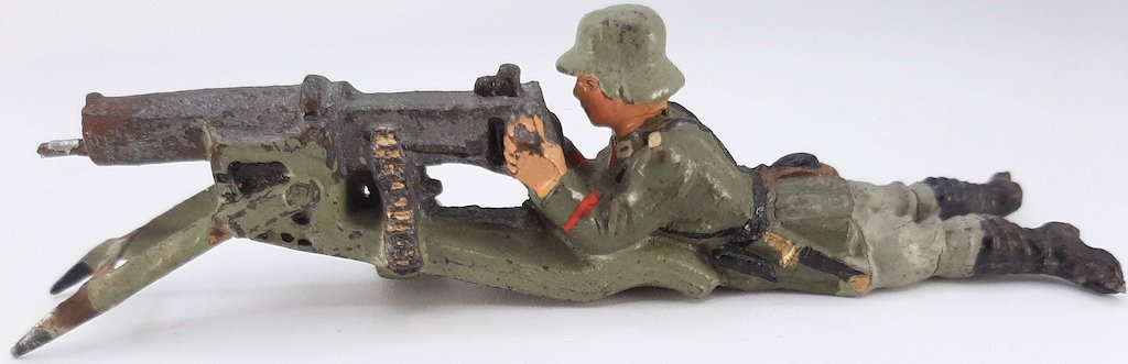 1930s GERMANY SOLDIER MACHINE GUN TOY LINEOL SHOOTER WH: ORIGINAL RARE MACHINE GUN SHOOTER SOLDIER TOY, MADE BY LINEO, GERMANY.