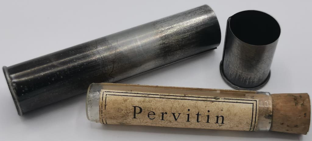 WW2 GERMAN SS PANZER WH NORMANDIE SOLDIER DRUG PERVITIN: AN EXTREMELY RARE TO FIND GLASS TUBE OF PERVITIN IN IT'S ORIGINAL CASE. EMPTY AMAZING PIECE OF HISTORY !! While other drugs were banned or discouraged, methamphetamine was touted as a miracle product 