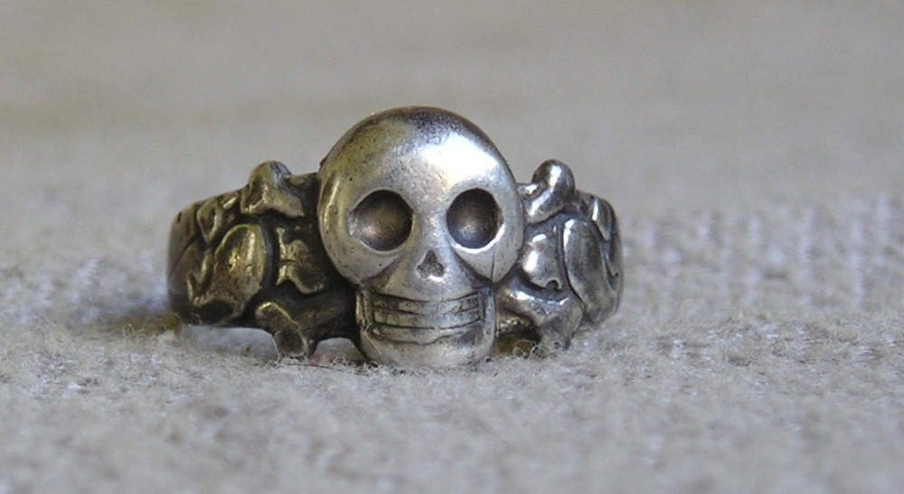 WAFFEN SS TOTENKOPF PANZER OFFICER SKULL SILVER RING TK: WW2 GERMAN NAZI AMAZING TEXTBOOK WAFFEN SS TOTENKOPF PANZER DIVISION OFFICER SILVER RING. SEE THE PHOTOS, IT IS SHOWN ON A MILITARY BOOK FROM AN ORIGINAL WW2 PHOTO... AMAZING PIECE OF HISTORY, 1000% O