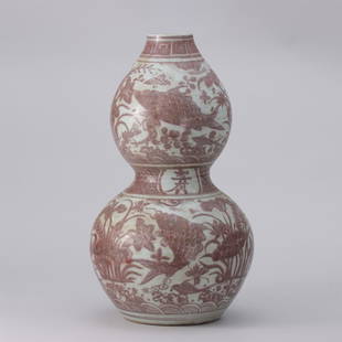 A CHINESE RED UNDERGLAZED PORCELAIN GOURDS VASE: H. 36 cm. W. 20 cm.