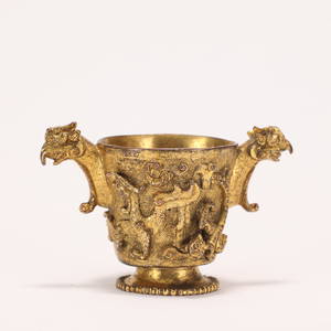 A CHINESE GILDING BRONZE CUP