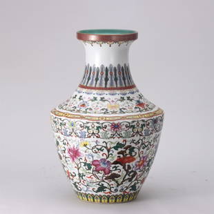 A CHINESE FAMILLE ROSE PORCELAIN FLOWERS ZUN VASE: H. 40 cm. W. 26 cm.