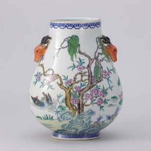 A CHINESE BLUE AND WHITE FAMILLE ROSE PORCELAIN FLOWERS BIRDS ZUN VASE: H. 21 cm. W. 20 cm.