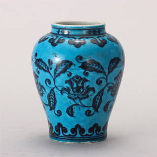 A CHINESE BLUE GLAZE PORCELAIN PORCELAIN FLOWERS JAR: H. 13 cm. W. 11 cm.