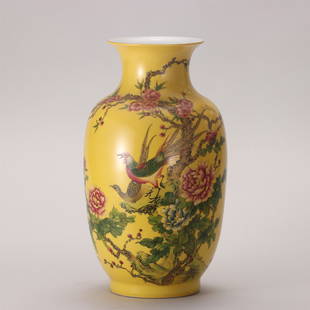 A CHINESE YELLOW GLAZED FAMILLE ROSE PORCELAIN FLOWERS BIRDS VASE: H. 38 cm. W. 21 cm.