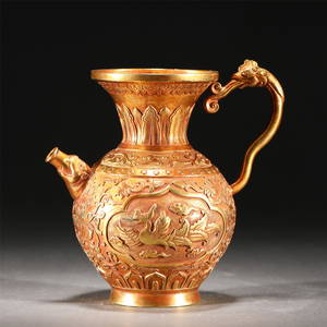 A CHINESE BRONZE EWER