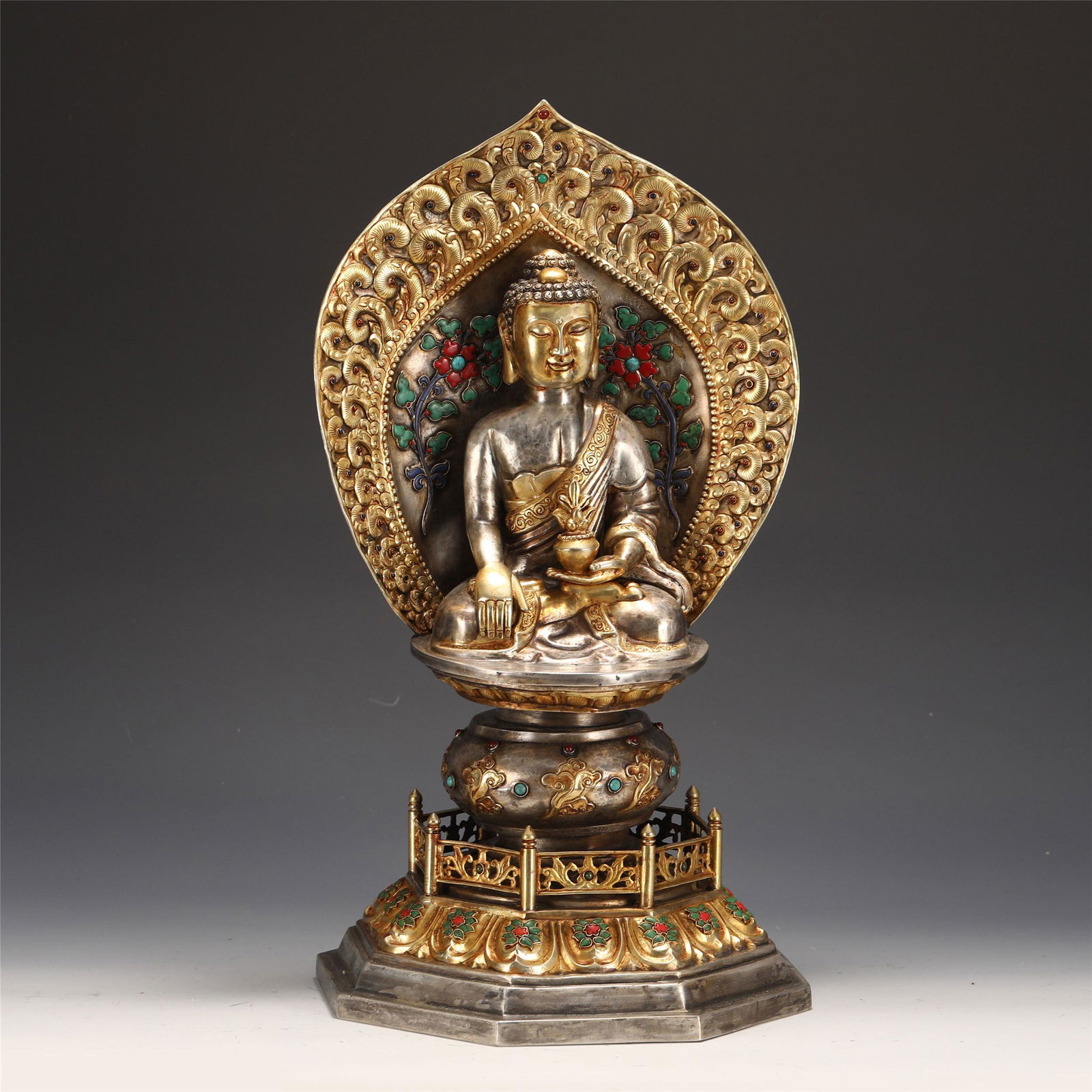 A CHINESE GILT SILVER FIGURE OF BUDDHA STATUE (1 of 11)