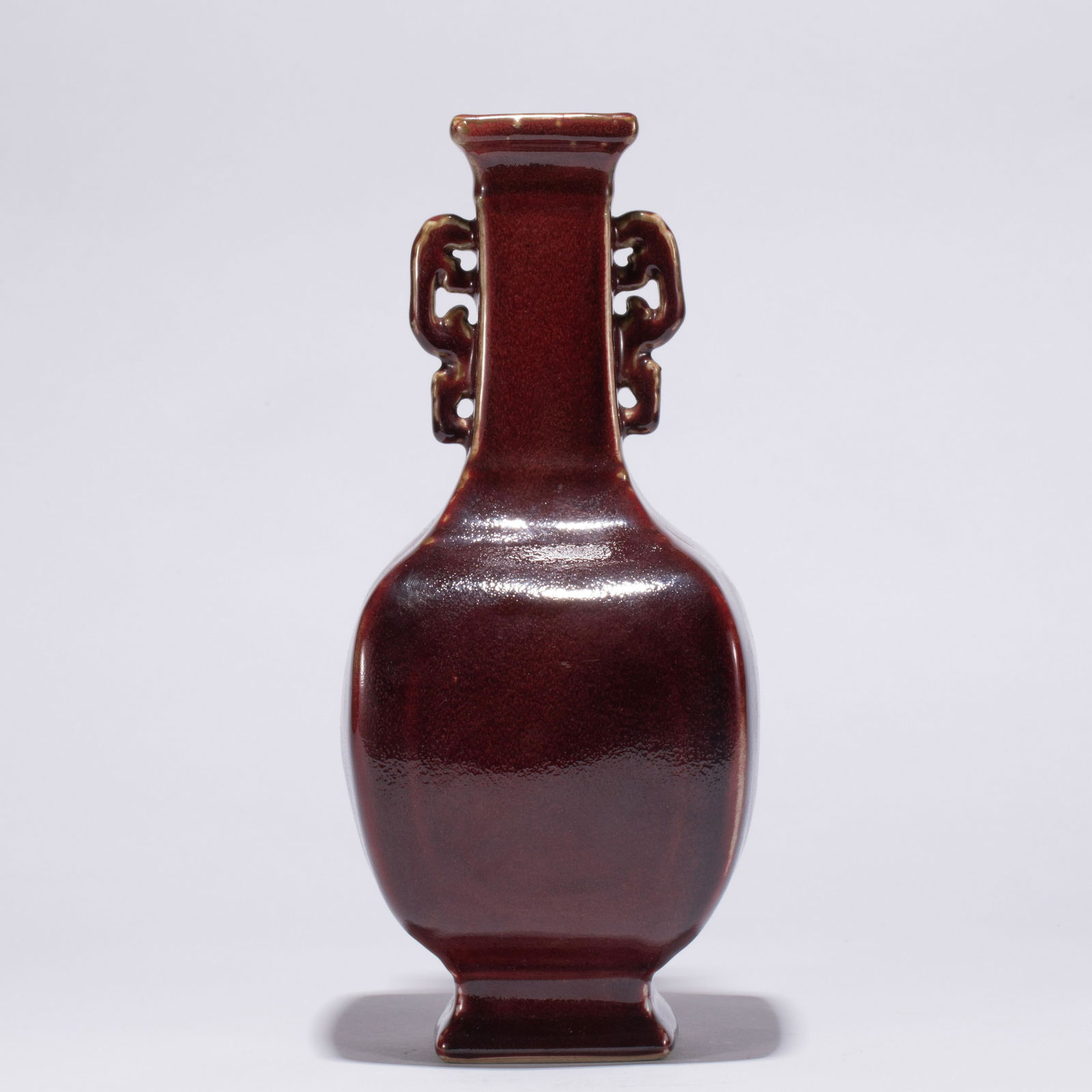 A CHINESE RED GLAZE PORCELAIN DOUBLE HANDLE VASE (1 of 11)
