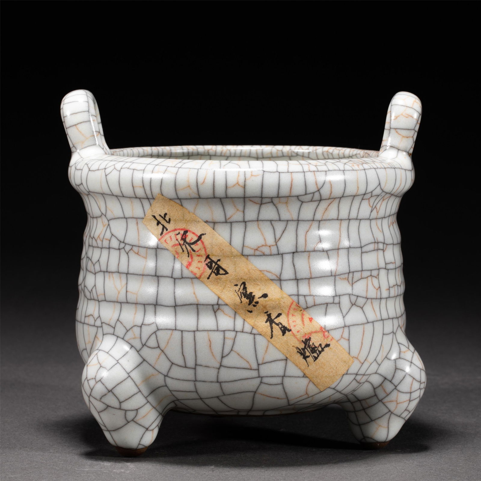 A CHINESE CRACKED GLAZE PORCELAIN TRIPOD CENSER (1 of 10)