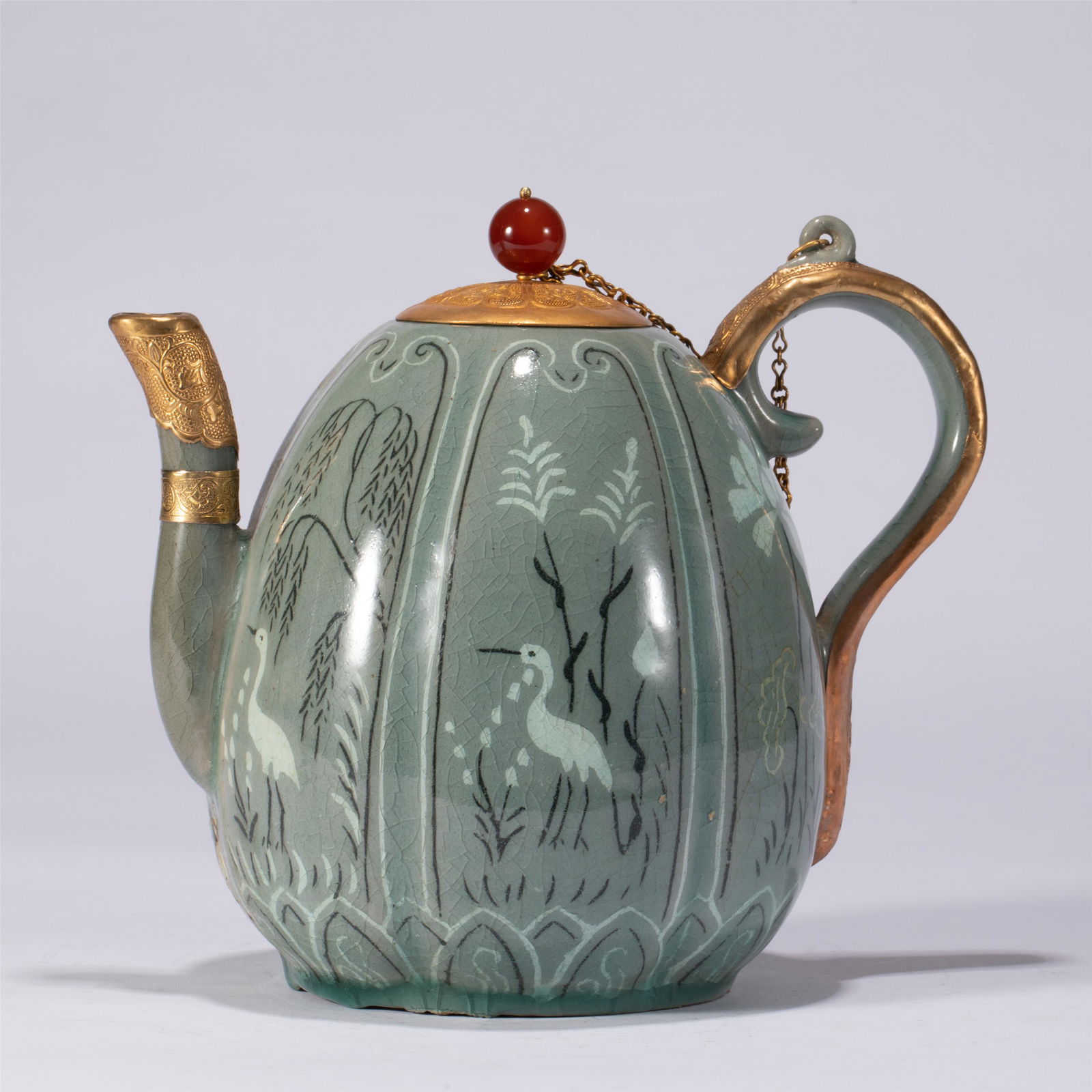A CHINESE CELADON GLAZE PORCELAIN TEAPOT (1 of 12)