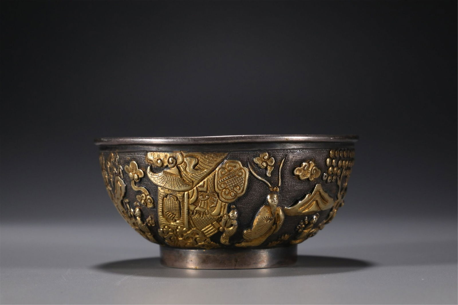A CHINESE GILT SILVER FIGURE STORY CUP (1 of 9)