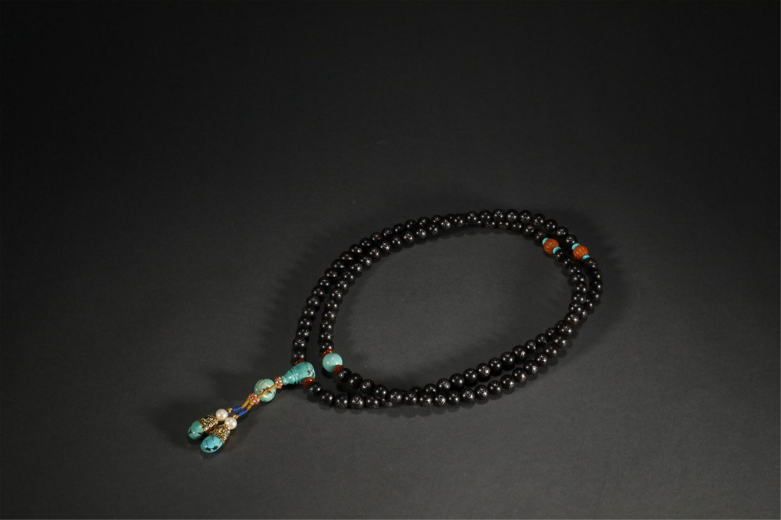 A CHINESE ZITAN CLOUDS PATTERN BUDDHIST BEADS (1 of 9)