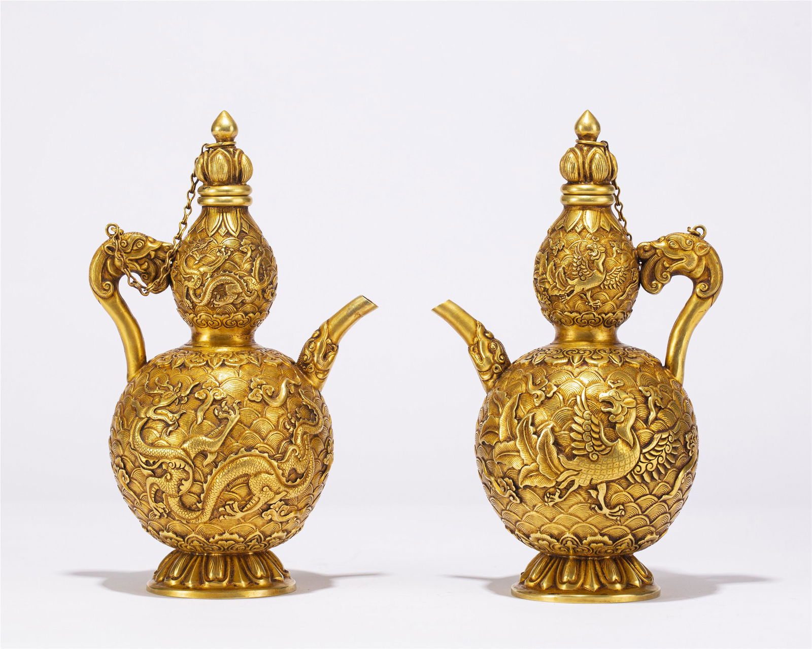 A PAIR OF CHINESE GILT BRONZE DRAGON PATTERN EWERS (1 of 8)