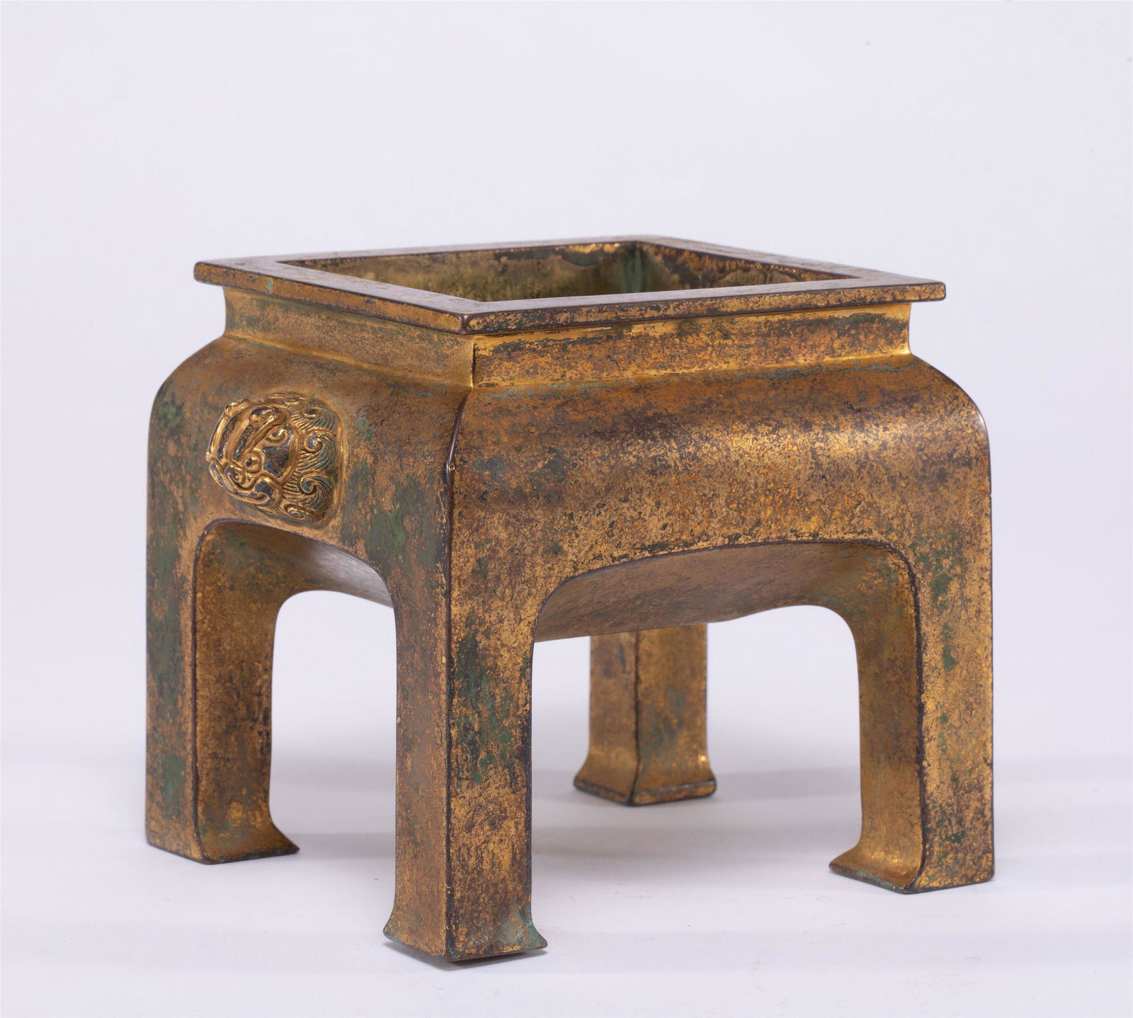 A CHINESE GILT BRONZE FOUR FEET CENSER (1 of 8)