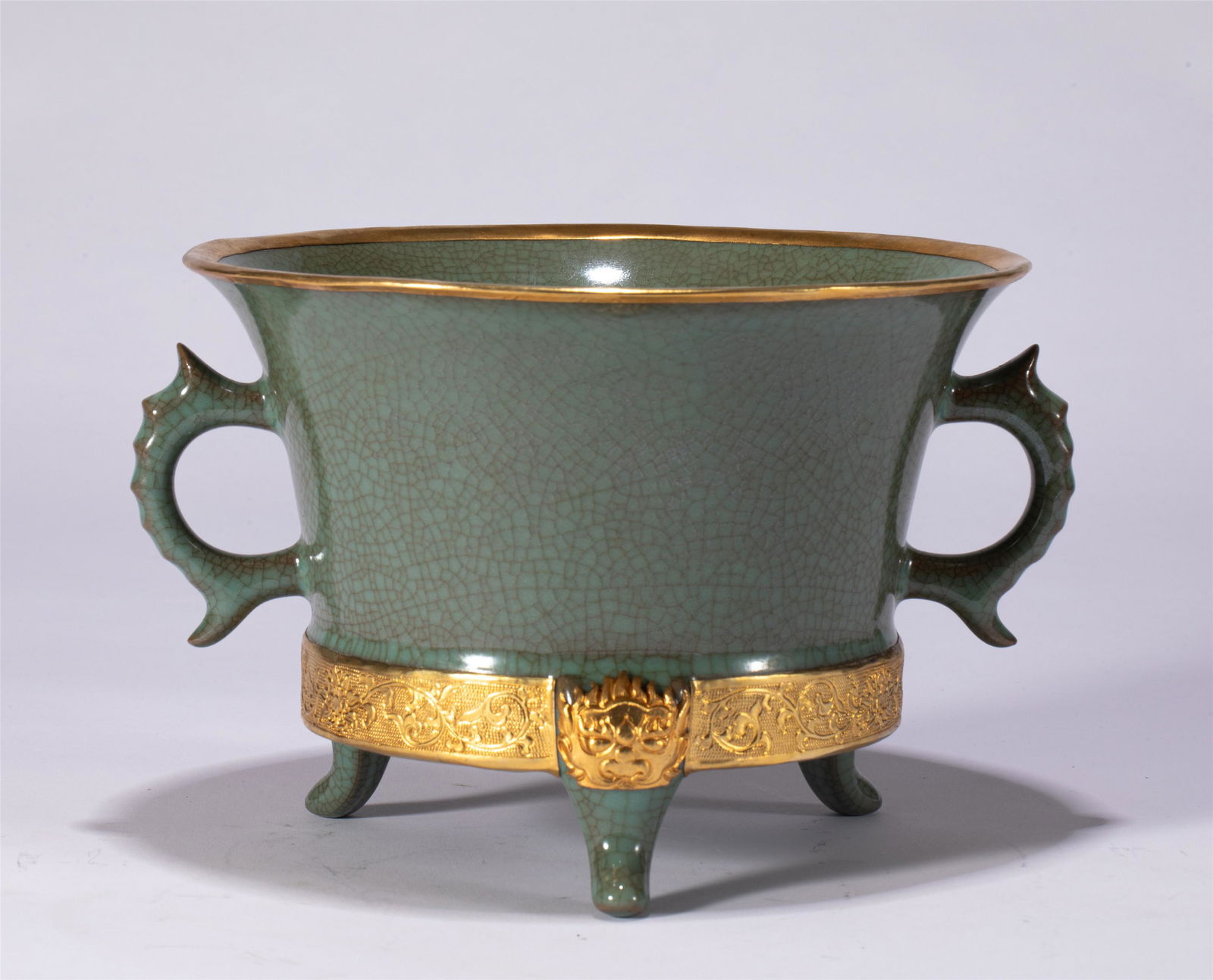 A CHINESE CELADON GLAZE PORCELAIN TRIPOD BOWL (1 of 9)