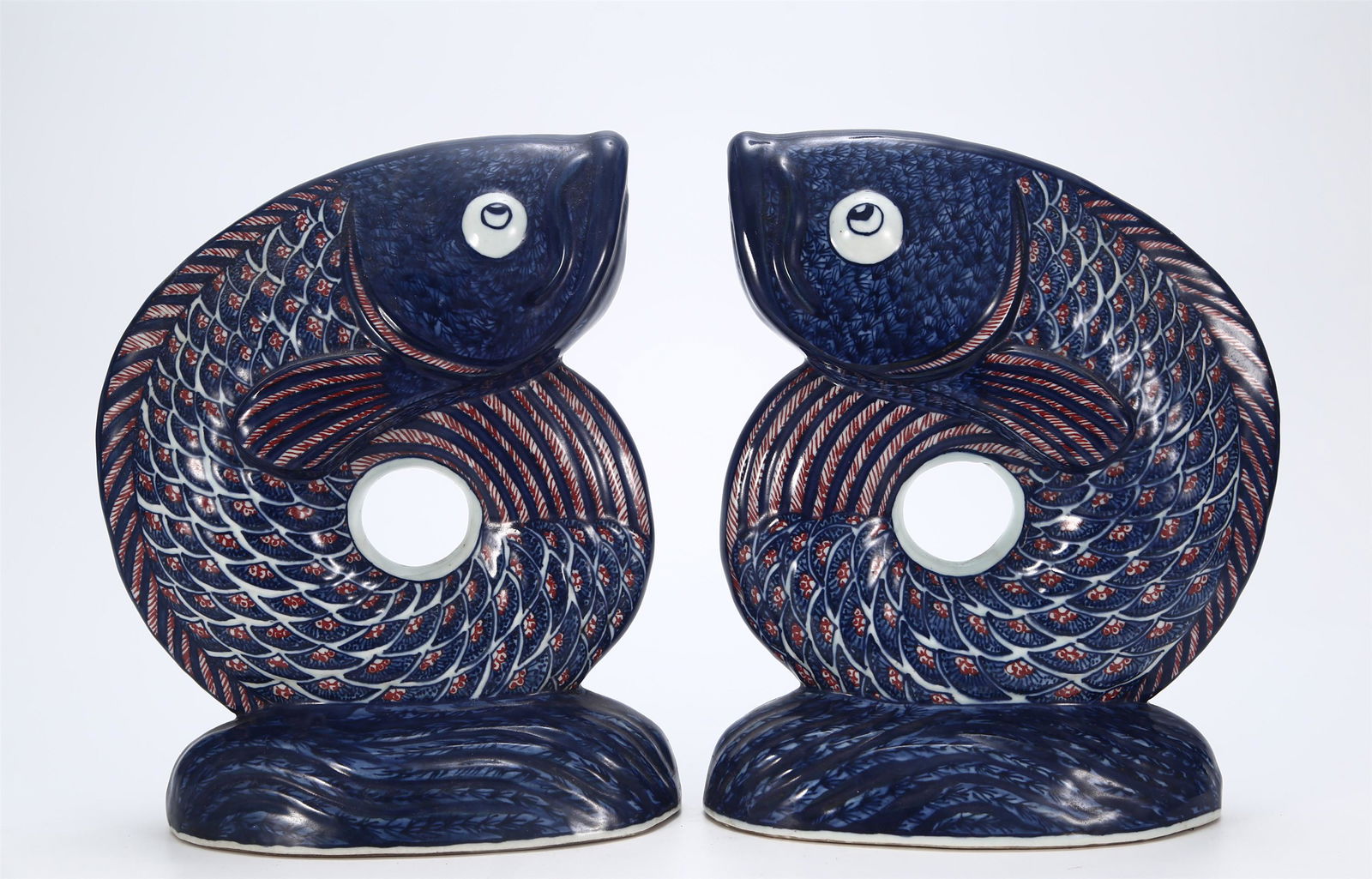 A PAIR OF CHINESE BLUE AND WHITE UNDERGLAZED RED PORCELAIN FISH ORNAMENTS (1 of 9)