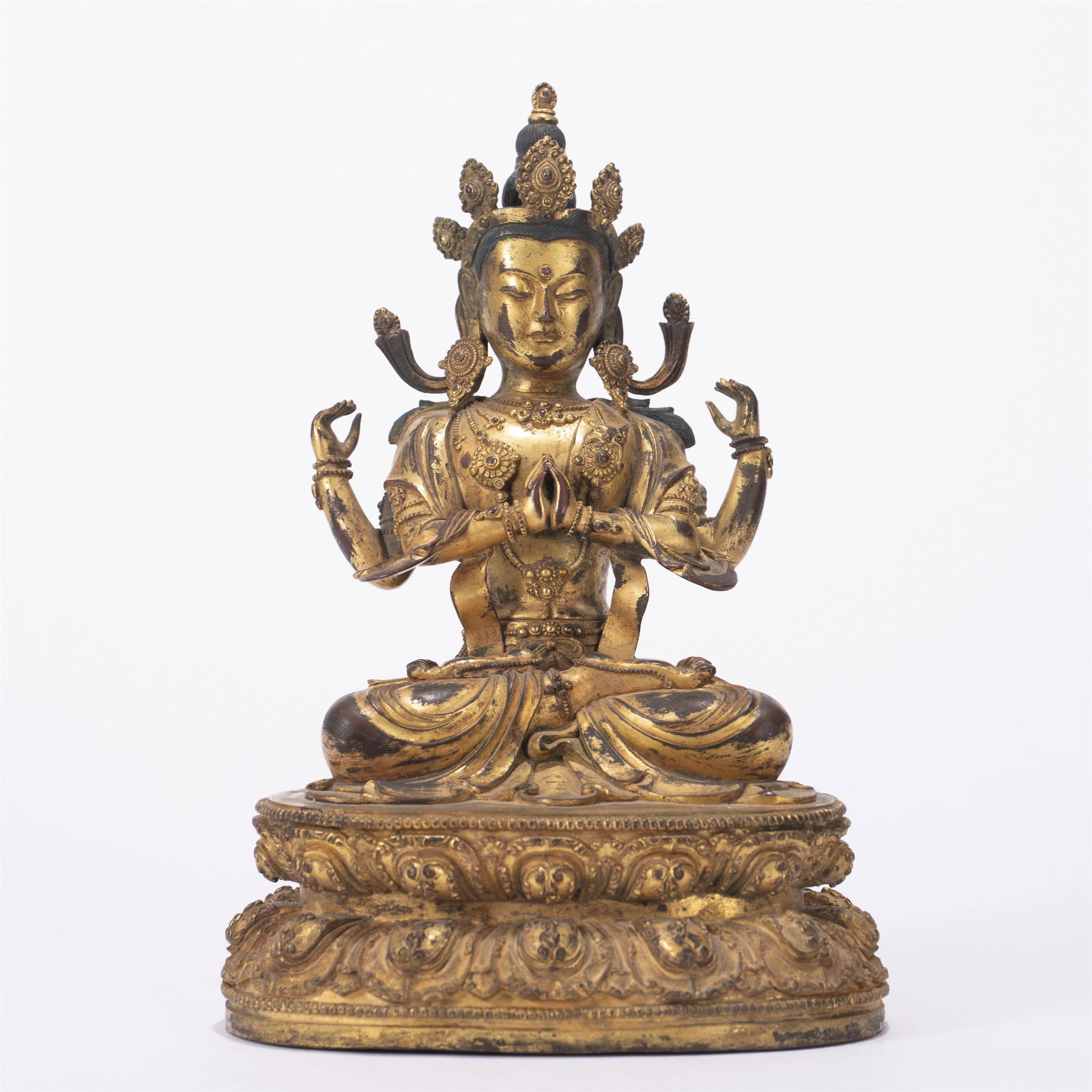 A CHINESE GILT BRONZE FOUR ARMS FIGURE OF BUDDHA STATUE (1 of 10)