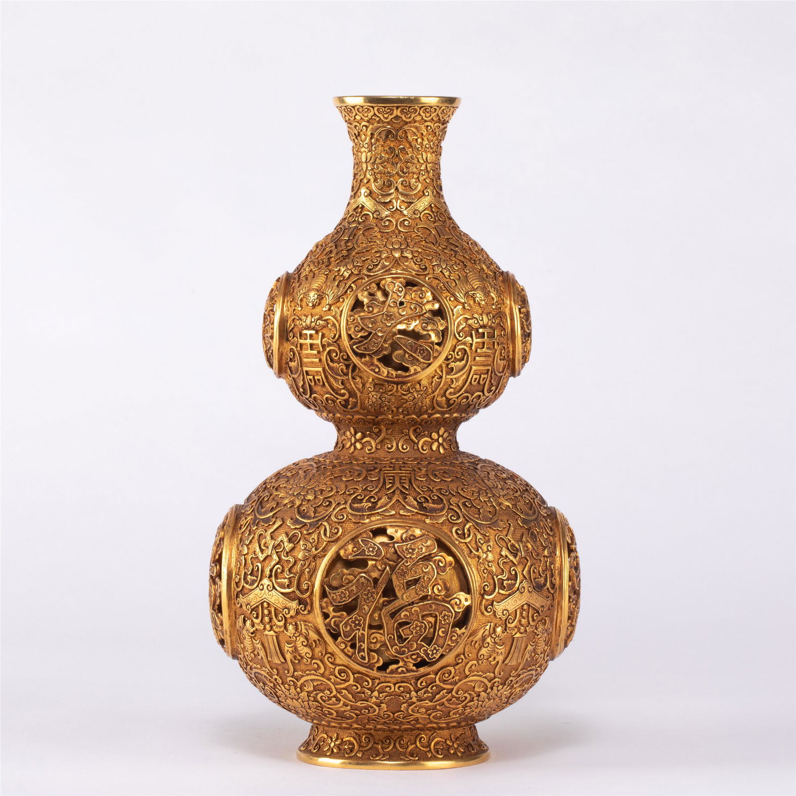 A CHINESE GILT BRONZE GOURD VASE (1 of 10)