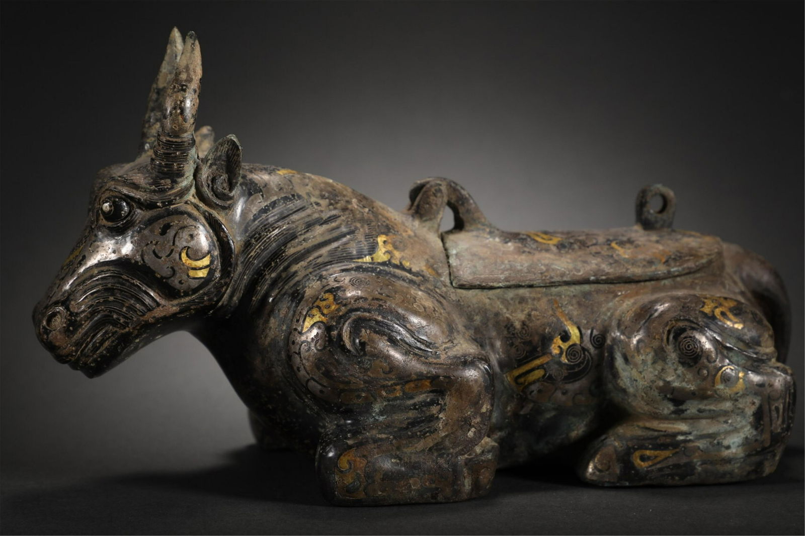 A CHINESE PAINTED GOLD AND SILVER CATTLE ORNAMENTS (1 of 9)