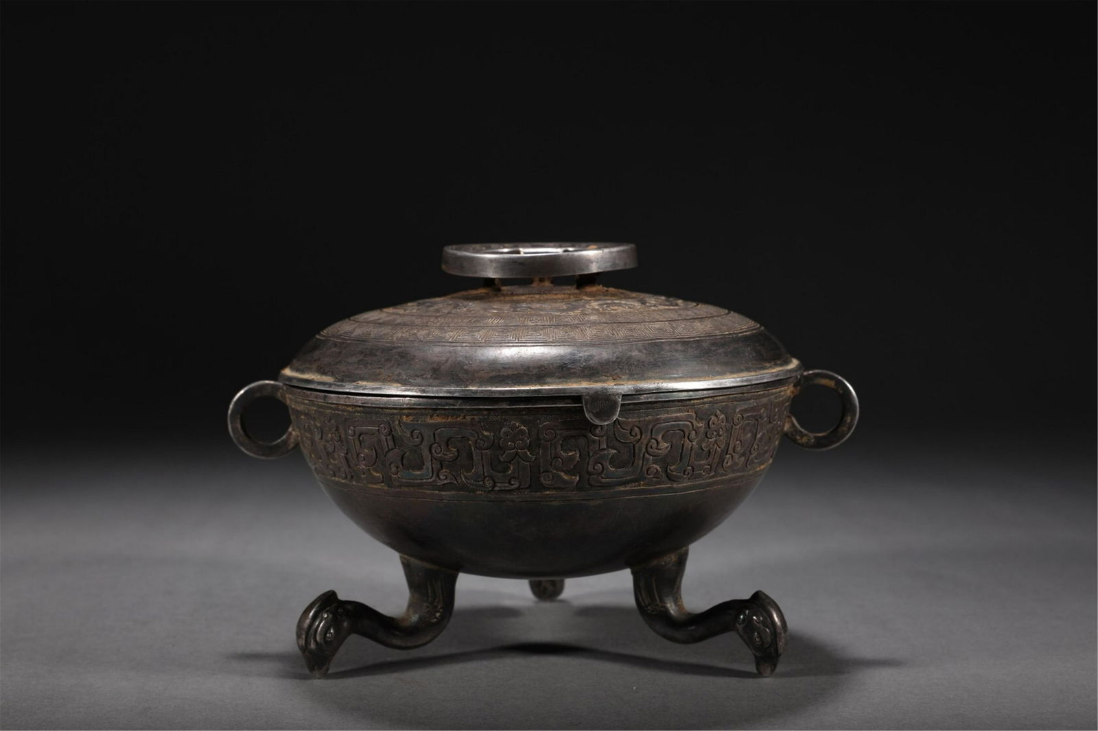 A CHINESE SILVER VIEWS TRIPOD POT (1 of 9)