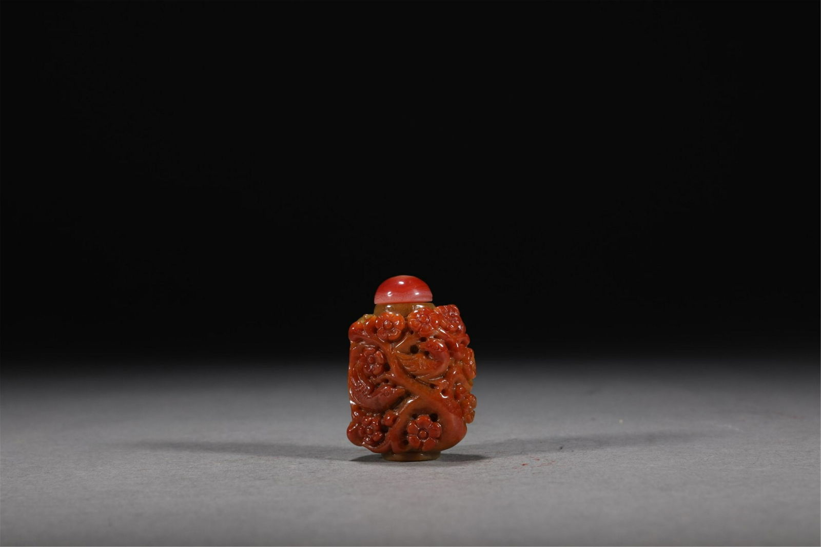A CHINESE RED JADE SNUFF BOTTLE (1 of 9)