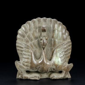 A Chinese Carved Jade Phenix Statuette