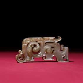 A Chinese Carved Jade Dragon Pendant